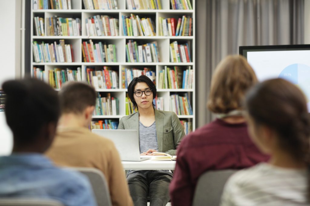 Young writer presenting his book